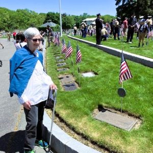 Carole Ludwig Drake honored her husband, U.S. Army Cpl. Douglas Drake, at the Memorial Day ceremony at Riverside Cemetery at the Veteran’s Lot on May 25. (Courtesy photo of Joanie Allbee)