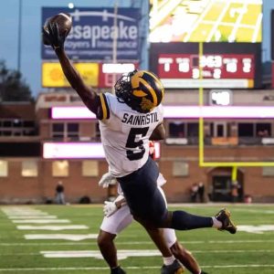 University of Michigan defensive back Mike Sainristil of Everett made a sensational one-handed grab in a game this fall to help lead his Wolverine teammates to a 14-0 season that culminates on Monday night against the University of Washington in the national championship game in Houston. (Courtesy photo / University of Michigan website)