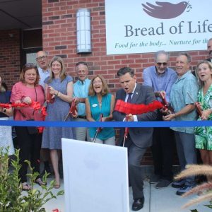 City and state officials along with Bread of Life (BOL) staff celebrated the Grand Opening with a ribbon cutting. Shown from left to right, are: Development Director Patty Kelly, Ward 3 City Councillor Amanda Linehan, Ward 1 Councillor Peg Crowe, Council President/Ward 6 City Councillor Stephen Winslow, State Rep. Kate Lipper Garabedian, Metro North Housing Corporation President Daniel LeBlanc, Executive Director Gabriella Snyder Stelmack, Malden Mayor Gary Christenson, Metro North Housing member Larry Gottlieb, Medford Mayor Breanna Lungo-Koehn, Bread Of Life Board Member Chris Chitouras, Bread of Life President Sean Twomey, and Councillor-At-Large Karen Colón Hayes.