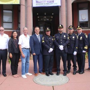 City officials, shown from left to right: Executive Officer Sean Randall, School Committee member John Kingston, School Committee Member Jacqueline Monterroso, Ward 2 City Councillor Ira Novoselsky, Acting Mayor/Mayoral candidate Patrick Keefe, Jr., newly promoted Officers Jeffrey Langone, Nick Fantasia and Kevin Colannino, Police Chief David Callahan, Mayoral candidate/Councillor-at-Large Steven Morabito and Revere School Committee candidate/Northeast Metro Tech School Committee Member Anthony Caggiano.