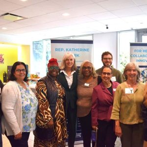 Pictured from left to right: Congresswoman Katherine Clark with members of the Malden River Works Steering Committee: Ramon Norales, Souad Akib, Erga Pierrette, Congresswoman Clark, Marcia Manong, Karl Alexander (back), Karen Colón Hayes (front), Karen Buck, Rebekah McPheeters.