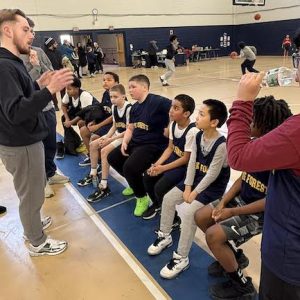 COACHING THEM UP — Wake Forest coaches Peyton Carron and Ryan McMahon instruct during a timeout. (Advocate Photos/Henry Huang)