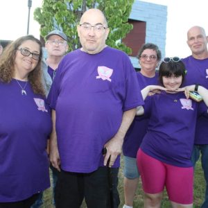 Mom’s Cancer Fighting Angels: Shown from left to right: Darlene Coates, Jodi Comeau, John Gilmore, John Melanson, Brenda Moley, Alexis Comeau and Team Captain Guy Moley during Sunday’s 10th Annual American Cancer Society/Mom’s Cancer Fighting Angels car show at Saugus High School.