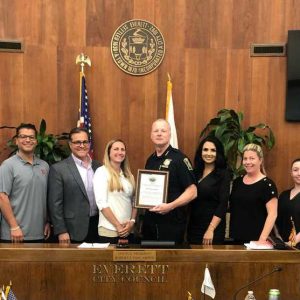 JOB WELL DONE: The Everett City Council honored retiring Police Chief Steven Mazzie at their June 10th meeting for 32 years of service, including 20 as Chief, to the citizens of Everett. Shown with Chief Mazzie, from left, are; councillors Wayne Matewsky, Michael Marchese, John Hanlon, Anthony DiPierro, Council President Robert Van Campen, Stephanie Smith, Chief Mazzie, councillors Stephanie Martins, Holly Garcia, Katy Rogers, Guerline Alcy Jabouin and Peter Pietrantonio.