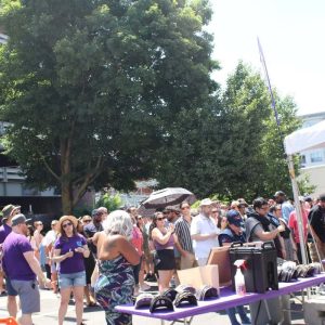 Members of the crowd waited in line along Exchange Street to sample food and drink from Malden and other surrounding communities’ restaurants.