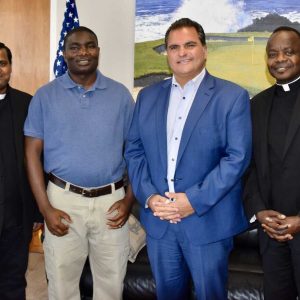 Pictured from left to right: Father Albert John Baskar, Father Mathias Chungu, Mayor Carlo DeMaria and Father Joseph Chacha Marwa, administrator of Immaculate Conception Parish.