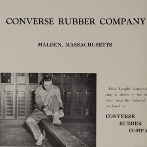 Moyle “Duke” Langille laces up his Chuck Taylors before a game.