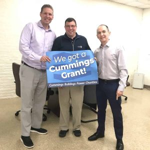 Pictured from left to right: Cummings Properties Account Manager David Harvey, The Immigrant Learning Center Executive Director Vincent Rivers and The Immigrant Learning Center Director of Development Mark Correia.