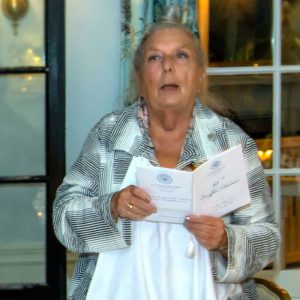 Chef Denise is shown reading the course descriptions at the Boston Dames Escoffier Dinner last year. This year she’s the main event. (Courtesy Photo to The Saugus Advocate)