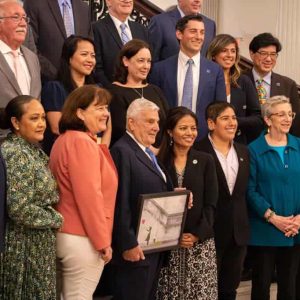 State Rep. Paul Donato is shown being presented with the Foster Care Legislator of the Year Award at the Grand Staircase at the State house in Boston on Thursday.