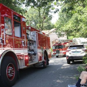 HAPPY BIRTHDAY: Former Revere Firefighter Maurice DiBlasi waves to Saugus firefighters as they drove by to celebrate his 103rd birthday.  (Advocate photo by Tara Vocino