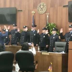 Shown in no particular order: Taking their oath as Everett fire fighters were Rodney Durand, Matthew Invernizzi, Hunter Poulos, Tori Cyrus, Alexander Pabrezis, Anthony Defeo and Patrick Neary on Monday evening at Everett City Hall.  (Photo courtesy of Ronald Coleman)