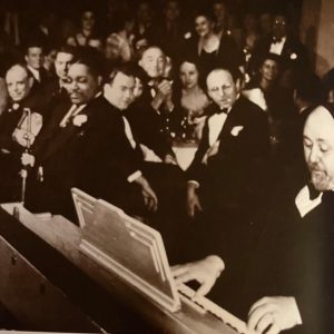 In this rare photo: “Linden on the Saugus Branch” renowned novelist — Malden boy Elliot Paul (at the piano) in 1949 playing at President Harry Truman’s inauguration in Washington, D.C., as a guest of Truman and Albert Ammons, legendary American boogie-woogie piano player. Mr. Paul was a pupil of Mr. Ammons.