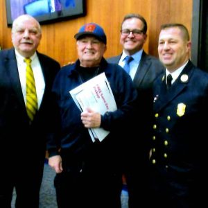Pictured from left to right: Ward 1 Councillor Wayne Matewsky, Retired Fire Captain Gerry O’Hearn, City Council President Robert Van Campen and Everett Fire Chief Joseph Hickey. (Photo courtesy of Councilman Matewsky)