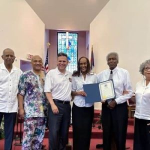 Guest Preacher Dr. Milton Thomas, Pastor Wayne Gadie, Mayor Gary Christenson and members of Emmanuel Baptist Church (photo courtesy of the City of Malden)