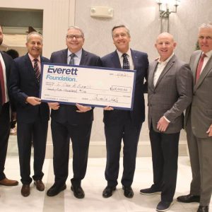 Shown from left to right: Everett Co-operative Bank Charitable Foundation Member Sandro Colarusso, Everett Bank Board of Directors Member Joseph Sachetta, Everett Bank Executive VP John Migliozzi, Everett Bank President/CEO Richard O’Neil Jr., “E” Club President Michael LaCourt and Everett Bank Chairman of the Board Dennis Leonard. Everett Bank donated $25,000.