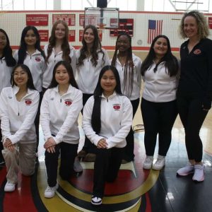 Shown from left to right in the back row are, Simran Tamang, Rosena Pun, Alanna O'Brien, Rebecca Hickey, Kirsty Hall, Yasmine Laabadla, and Coach Courtney Meninger. Shown from left to right in the front row are, Jessica Du, Tracy Pham, and Nga Ho.
