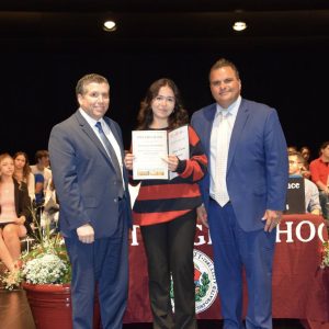 Mayor Carlo DeMaria and State Senator Sal DiDomenico alongside Adriana Escobar Rodriguez, who received the Salvatore J. Rauseo, Everett High School, Class of 1956 Memorial Scholarship.