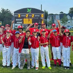 The Everett Little League All-Stars are shown celebrating their District 12 title at the annual Williamsport Tournament in Dorchester last week.