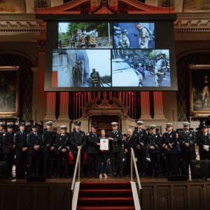Governor Maura Healey and State Fire Marshal Jon M. Davine recognized instructors and support staff of the Massachusetts Firefighting Academy for their lifesaving actions after a recruit went into cardiac arrest during training earlier this year. In addition to training the next generation of firefighters, they are all active or retired firefighters in the cities and towns of Arlington, Belmont, Boston, Cambridge, Dudley, Everett, Fitchburg, Hopedale, Lowell, Lynn, Mansfield, Salem, Shrewsbury, Waltham, and Worcester.