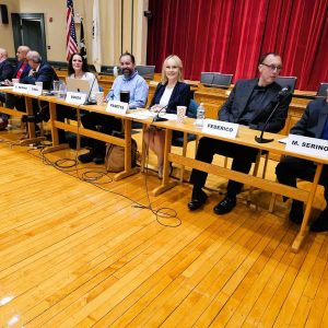FIELDING QUESTIONS: The nine candidates running for the five Board of Selectmen seats in the Nov. 4 town election awaited the beginning of the candidates’ forum sponsored last week by the Saugus Action Volunteers for the Environment, which is also known as SAVE. (Saugus Advocate photo by Mark E. Vogler)