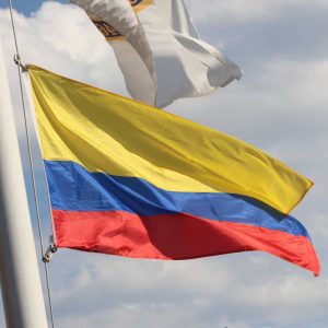 ALL OR NOTHING: The Colombian flag, among other national flags, was raised outside city hall in honor of the country’s independence during a ceremony in July.  (Advocate file photo)