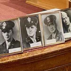 Framed photos of the Four Chaplains were on display during a special memorial service honoring them last Sunday. (Courtesy Photo of Joanie Allbee)