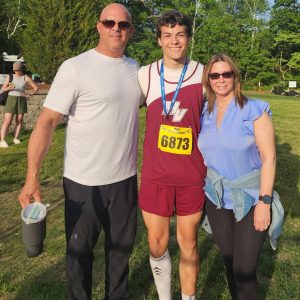 Shown from left to right are Christian Fraser and his parents, Jeff, Christian and Stacey.