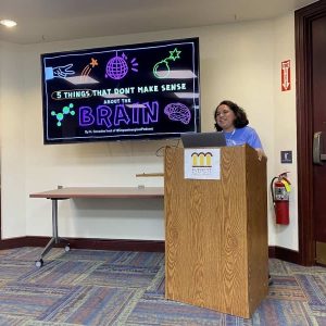Community member K presents interesting facts about the brain at FRED Talks.