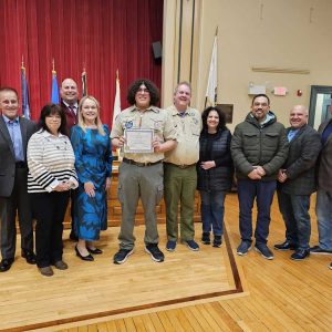 GUEST OF HONOR: The Board of Selectmen invited new Eagle Scout Emmitt Lozano, his parents and his scoutmaster to Tuesday night’s meeting, where he received a citation recognizing his achievement in earning his Eagle Scout badge. (Saugus Advocate photo by Mark E. Vogler)