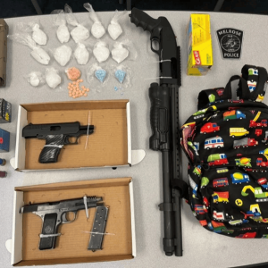 GUNS AND DRUGS: Reportedly, police seized these drugs, firearms and ammunition found during a search of a home on Sylvan Street in Melrose on Saturday, March 9, after arresting a Saugus man. (Photo Courtesy Melrose Police Department)