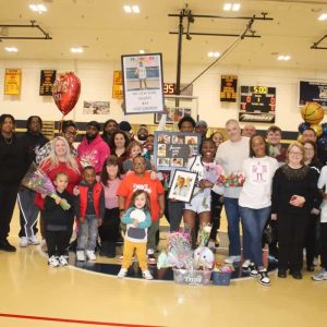 IN DAD’S MEMORY: Tori Gammon was accompanied by Head Coach Scott Marino, Lisa Marino, father Edward Buckley, a portrait of her late father Scott Gammon, siblings Cassandra, Jamal, Clifton and Elijah and cousin Justin. She plans to play basketball in college; hopefully, at Howard University in D.C., where she plans to study health sciences and minor in psychology to become a radiologist or to pursue sports medicine.