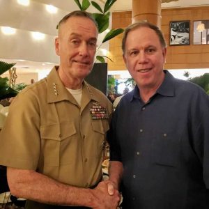 U.S. Marine Corps General Joseph Dunford, Commandant of the U.S. Marine Corps from Mass., and Malden VSO Kevin Jarvis on the island of Guam in February 2015. Dunford and Jarvis are linked through their involvement with the Iwo Jima Association of America and events commemorating the Battle of Iwo Jima, some of which involved travel to Guam. (Courtesy photo, Kevin Jarvis)