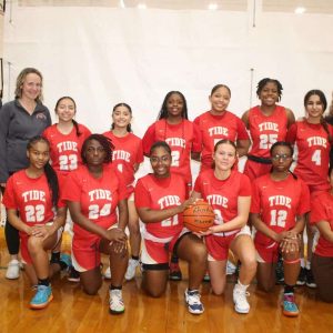Bottom row, shown from left to right: Malica Guillaume, Taisha Alexandre, Dori Vilson, Emilia Maria-Babcock, Malaica Guillaume, and Gleidy Tejada Sanchez. Top row, shown from left to right: Assistant Coaches Alex Strempel with Courtney Meninger, Casey Martinez, Sonia Flores, Clarice Alexis, Gerniah Boyce, Kaesta Sandy, Manal Bouhou, Katerin Landaverde and Head Coach Riley Dunn.
