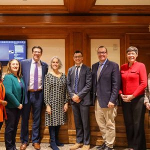 From left to right: Metropolitan Beaches Commissioners Nicole McClain, Margaret LaForest, Rep. Adrian Madaro, Department Conservation and Recreation Commissioner Nicole LaChapelle, Save the Harbor/Save the Bay Executive Director Chris Mancini, Rep. David Biele, Rep. Joan Meschino, and Commissioner Susan Hamilton.