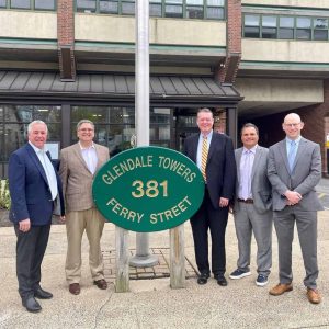 Shown from left to right: State Rep. Joe McGonagle, Everett Housing Authority Director Steve Kergo, Executive Office of Housing and Livable Communities (EOHLC) Secretary Ed Augustus, Mayor Carlo DeMaria and EOHLC Undersecretary of Public Housing and Rental Assistance Ben Stone after meeting at Glendale Towers.