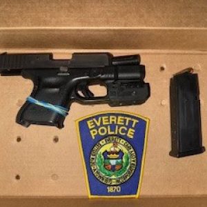 A 40-caliber Glock 27 handgun and ammunition confiscated by Everett Police (Courtesy of Everett Police Dept.)