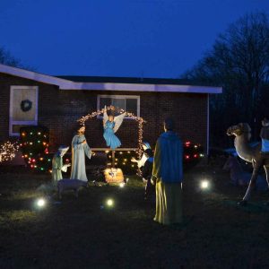 HOLY NIGHT The life size nativity scene at the Palma family home near Forest Street rode here several years ago in a pick-up truck