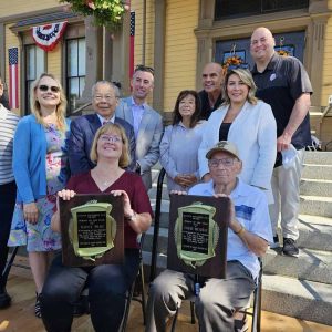 HONORED GUESTS: Nancy Prag and Eugene Decareau displayed their “Person of the Year” Award plaques after a Founders Day Ceremony in front of Town Hall last Saturday. Joining them were selectmen, Town Manager Scott C. Crabtree and members of the state Legislative delegation. (Saugus Advocate photo by Mark E. Vogler)
