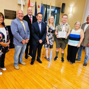 HONORING AN EAGLE: At Tuesday night’s meeting, the Board of Selectmen presented Peter Walsh with a Citation “on his achieving the prestigious rank of Eagle Scout, the highest honor in Scouts BSA. …. The Board and entire community commend you for this significant milestone and your continued pursuit of excellence.” (Saugus Advocate Photo by Mark E. Vogler)