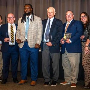 ALL “IN THE HALL”: The newest Golden Tornado Hall of Fame inductees, pictured from left to right, are Katie Bowdridge, Steve DeBenedictis, Darrin Smith, Witche Exilhomme, Ron Fales, Kevin Carpenito, JulAnn (Lopresti) Casaletto and Robert O’Keefe Jr.