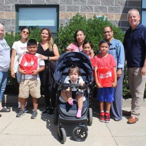 Shown from left to right: Parent Teacher Organization President Christine Reno, Celine Hoffens, Vilma Cardoza, Deysi Cubias, Keverian School fourth-grader Evelyn Fuentes, 9, Keverian third-grader Selvin Madrid, 8, Elizabeth Madrid, Keverian third-grader Denilson Manue, and Supt. of Schools William Hart.