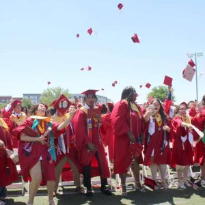 Graduates tossed their caps into the air during Saturday’s graduation ceremony at Everett Veterans Memorial Stadium.