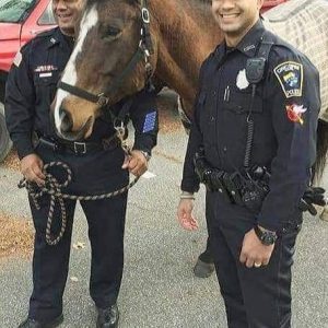 Shown from left to right: Officer Jusino, horse Jusino and son Officer Jusino Jr. (Courtesy photo, Horses and Heroes Foundation President Skyllar Mulvanney)