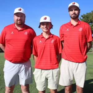 Sachems Captain Hunter Arsenault is flanked by coaches Joe and Daniel Bertrand. (Advocate file photo)