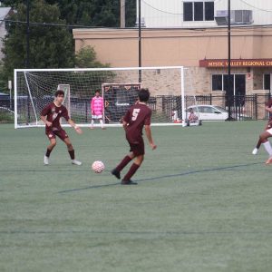 Sebastian Saad (#21) received a pass from Angelo Coelho (#5) during recent soccer action.