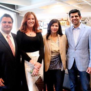 City “enVisions” bright future as first hotel opens  
---
A VISION COME TRUE: Mayor Carlo DeMaria and his wife, Stacy, are shown with Global Vision Hotels President Gautam Sharma and Principal/Senior Vice President Revenue Development Shikha Talwar at the ribbon-cutting ceremony for enVision Hotel Everett on Monday, April 10. --   A boutique hotel featuring 101 rooms, its design, which was developed by Jessica Smith, evokes the history of Everett and the 95-year-old building’s past as a shoe factory – from the front desk and a stack of vintage suitcases to design elements like old maps and sewing machines. The hotel also features a café, lounge and 1,300 sq. ft. meeting room on the ground floor able to accommodate about 50 people. A separate building connected to the hotel will feature a fitness center.