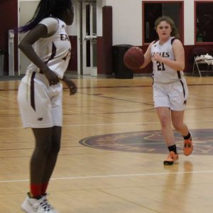 Bailey DeLeire (with the ball) and teammate Breana Nansamba.