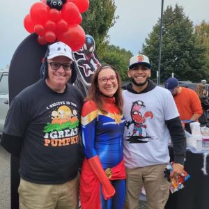 School Committeeman John Kingston is shown with candidates for Revere school committee, Kathryn Schulte Grahame, and Riaz Garcia at the recent Trunk or Treat.  (Courtesy photo)