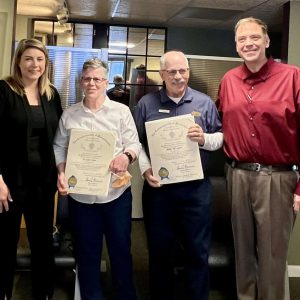 Shown from left to right: State Representatives Jessica Giannino and Jeffrey Turco with Dr. Janis Cotter (in white) and “PJ” Cotter (in blue).